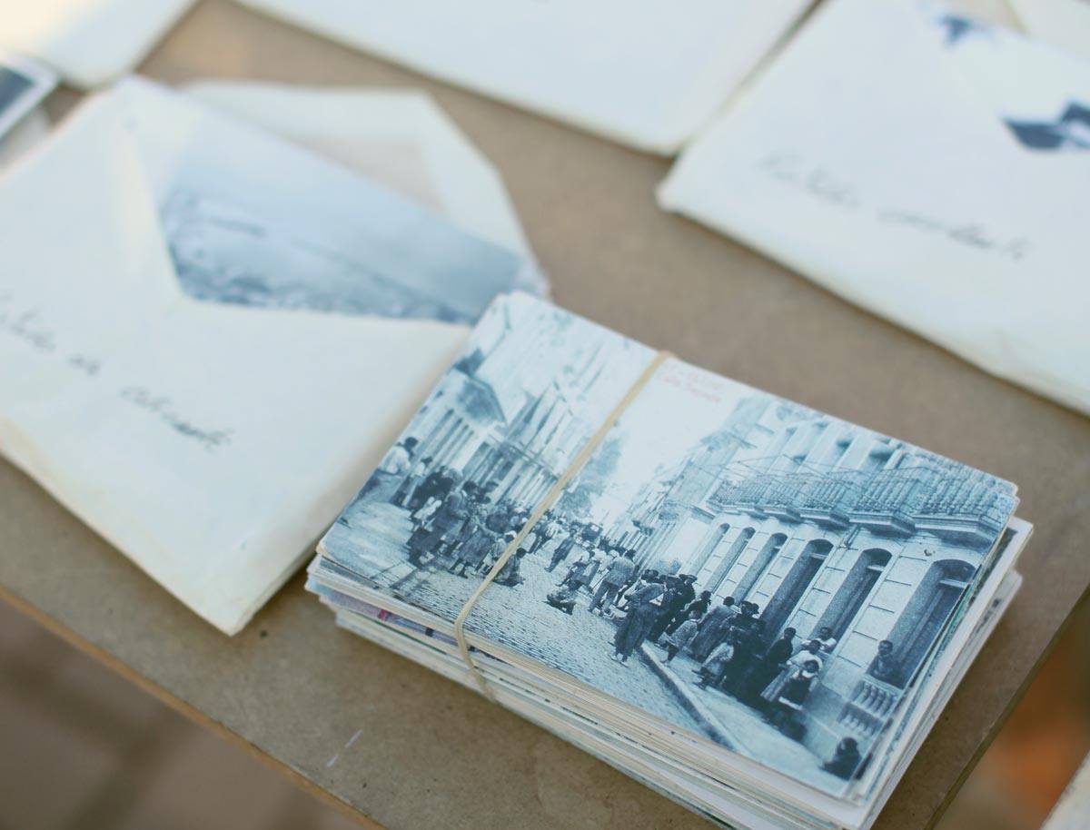 old letters filled with black and white photographs